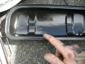greasing the rocker cover before applying the gasket