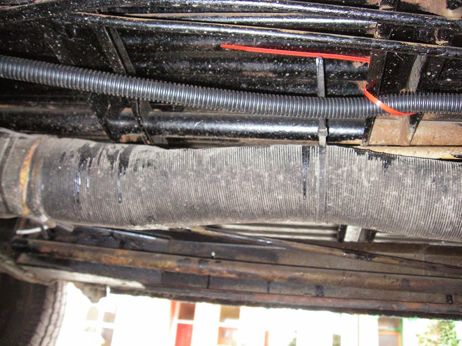 cables running under the VW Bay window in conduit to protect them.