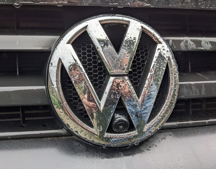 VW badge with embedded camera